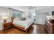 Comfortable bedroom with hardwood floors, a ceiling fan, and a dormer window with built-in seating at 735 Longwood Nw Dr, Atlanta, GA 30305