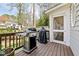 Deck area with a stainless steel gas grill and a covered outdoor area at 735 Longwood Nw Dr, Atlanta, GA 30305