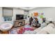 Cozy room with a large tv, golf equipment and a decorative rug at 735 Longwood Nw Dr, Atlanta, GA 30305