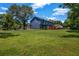 This home boasts a large, green backyard with lots of space and trees around at 2505 Tiffany Se Ct, Conyers, GA 30013