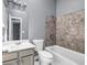 Bathroom featuring a shower-tub combination and a single sink vanity at 2505 Tiffany Se Ct, Conyers, GA 30013