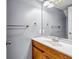 This bathroom features a single sink vanity and shower-tub combination at 2505 Tiffany Se Ct, Conyers, GA 30013