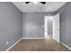 Empty bedroom features soft carpet, neutral walls, and a ceiling fan at 2505 Tiffany Se Ct, Conyers, GA 30013