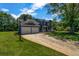 Charming two-story home with a long driveway and attached two-car garage at 2505 Tiffany Se Ct, Conyers, GA 30013