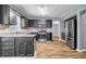 Modern kitchen boasts stainless steel appliances, ample cabinets, and granite countertops at 2505 Tiffany Se Ct, Conyers, GA 30013