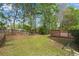 A wide shot of the backyard and deck at 3925 Tugaloo River Dr, Duluth, GA 30097