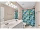 Bathroom featuring a dual sink vanity and a shower/tub combo at 3925 Tugaloo River Dr, Duluth, GA 30097