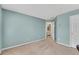 Bedroom featuring an open door to the bathroom at 3925 Tugaloo River Dr, Duluth, GA 30097