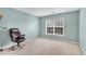 Bedroom with carpet, a single window, and a rolling office chair at 3925 Tugaloo River Dr, Duluth, GA 30097