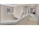 Upstairs hallway featuring a view of the front yard at 3925 Tugaloo River Dr, Duluth, GA 30097