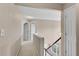 Upstairs hallway featuring two-panel doors at 3925 Tugaloo River Dr, Duluth, GA 30097