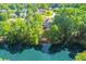 Aerial view of the home showcasing its desirable location with lake access at 5675 Habersham Vly, Suwanee, GA 30024