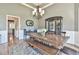 Charming dining room features a wooden table, bench seating, decorative rug, and a cabinet for elegant storage at 5675 Habersham Vly, Suwanee, GA 30024