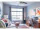 Bedroom with a daybed, large window, unique decor, and ceiling fan at 10 Perimeter Summit Ne Blvd # 4315, Brookhaven, GA 30319