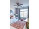 Bedroom features a daybed, study desk, and large window at 10 Perimeter Summit Ne Blvd # 4315, Brookhaven, GA 30319