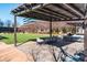 Outdoor courtyard area with dining tables, seating, and green space perfect for entertaining at 10 Perimeter Summit Ne Blvd # 4315, Brookhaven, GA 30319