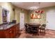 Resident gathering spot with kitchenette, pub table and comfortable leather chairs at 10 Perimeter Summit Ne Blvd # 4315, Brookhaven, GA 30319