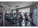 Bright fitness center with treadmills, ellipticals, and stationary bikes for a comprehensive workout experience at 10 Perimeter Summit Ne Blvd # 4315, Brookhaven, GA 30319