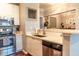 Modern kitchen featuring stainless steel appliances, white cabinets and countertops with lighting at 10 Perimeter Summit Ne Blvd # 4315, Brookhaven, GA 30319