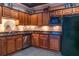 Stylish kitchen featuring granite countertops, stainless steel appliances, and custom wood cabinetry at 10 Perimeter Summit Ne Blvd # 4315, Brookhaven, GA 30319