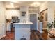 Well-lit kitchen featuring stainless steel appliances, light cabinetry, and a modern countertop with an eat-in bar at 10 Perimeter Summit Ne Blvd # 4315, Brookhaven, GA 30319