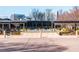 Modern pergola provides shaded outdoor seating with views of the business park landscape at 10 Perimeter Summit Ne Blvd # 4315, Brookhaven, GA 30319