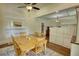 Elegant dining room featuring natural light and hardwood floors perfect for Gathering gatherings at 123 Nelson Street, Newborn, GA 30056