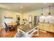 Open-concept kitchen featuring an island, stainless steel appliances, and seamless flow to the adjacent living areas at 123 Nelson Street, Newborn, GA 30056