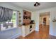 Eat-in kitchen with stainless steel appliances and access to backyard through window at 123 Nelson Street, Newborn, GA 30056