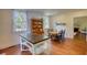 Bright kitchen area with stainless appliances, an island, and an adjacent dining area, perfect for Gathering gatherings at 123 Nelson Street, Newborn, GA 30056