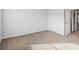 Neutral bedroom with plush carpet and ample natural light at 1707 Bouquet Way, Mcdonough, GA 30253
