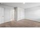 Bedroom with neutral carpet and white walls at 1707 Bouquet Way, Mcdonough, GA 30253