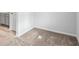 Bedroom featuring neutral carpet and trim at 1707 Bouquet Way, Mcdonough, GA 30253