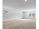 Large bonus room with neutral carpet and bright natural light from multiple windows at 1707 Bouquet Way, Mcdonough, GA 30253
