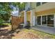 This home offers a private backyard area with some grass and tree coverage at 216 Buckland Dr, Alpharetta, GA 30022