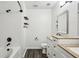 Modern bathroom with dual sinks, updated vanity, and shower/tub combo at 216 Buckland Dr, Alpharetta, GA 30022