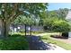 Community tennis courts with well-maintained landscaping and walking path at 216 Buckland Dr, Alpharetta, GA 30022