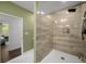 Elegant bathroom showcasing a tiled walk-in shower with glass partition, offering a spa-like experience at 3142 Chamblee Gap Rd, Cumming, GA 30040