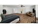 Large, open bedroom featuring wood floors, a comfortable seating area, and plenty of space for relaxation at 3142 Chamblee Gap Rd, Cumming, GA 30040