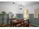 Cozy dining area with hardwood floors, stylish decor, and natural light, perfect for gatherings at 3142 Chamblee Gap Rd, Cumming, GA 30040