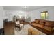 A bright and spacious living area with a dining table and updated kitchen at 3142 Chamblee Gap Rd, Cumming, GA 30040