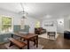 A well lit living room with hardwood floors, modern furnishings, and decor is set for comfortable living at 3142 Chamblee Gap Rd, Cumming, GA 30040