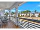 Open balcony with seating area and view of street and other homes at 5293 Hearthstone St, Stone Mountain, GA 30083