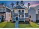 Charming two-story home with a welcoming front porch and beautifully landscaped front yard at 5293 Hearthstone St, Stone Mountain, GA 30083
