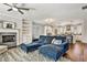 Comfortable living room featuring a fireplace and open kitchen layout at 5293 Hearthstone St, Stone Mountain, GA 30083