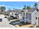 Street view featuring a charming neighborhood of homes with inviting front porches at 5293 Hearthstone St, Stone Mountain, GA 30083