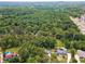 Scenic neighborhood with lush trees, swimming pools, and well-maintained homes at 626 Cheatham Sw Dr, Marietta, GA 30064