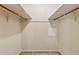 Walk-in closet with shelving and carpet at 626 Cheatham Sw Dr, Marietta, GA 30064