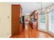 Traditional eat-in kitchen showcasing wood cabinets, modern appliances, hardwood floors, and natural light at 626 Cheatham Sw Dr, Marietta, GA 30064