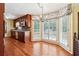 Traditional eat-in kitchen featuring wood cabinets, stainless steel appliances, hardwood floors, and a breakfast nook at 626 Cheatham Sw Dr, Marietta, GA 30064
